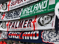 Scarves are at a merchandise stall before the UEFA Nations League 2024/5, League B, Group B2 match between England and the Republic of Irela...