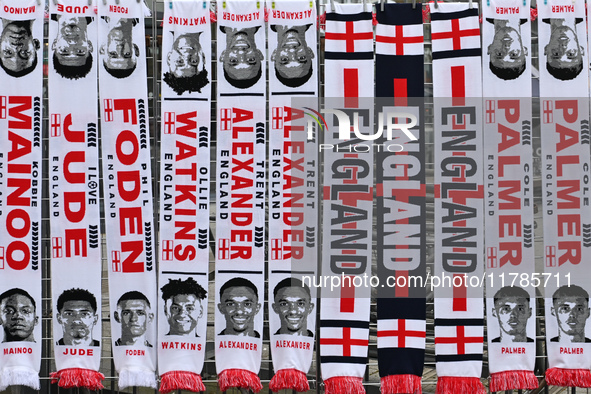 Scarves are on sale at a merchandise stall before the UEFA Nations League 2024/5, League B, Group B2 match between England and the Republic...