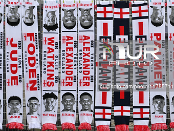 Scarves are on sale at a merchandise stall before the UEFA Nations League 2024/5, League B, Group B2 match between England and the Republic...