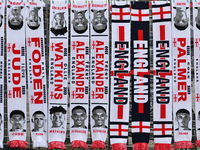 Scarves are on sale at a merchandise stall before the UEFA Nations League 2024/5, League B, Group B2 match between England and the Republic...