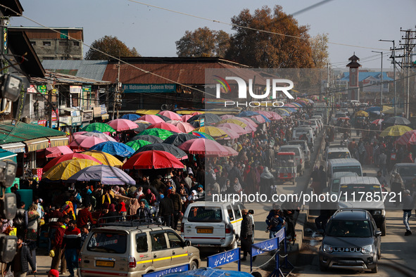 Kashmiri people purchase woolen clothes and other daily need products from the Sunday market ahead of harsh winters in Sopore, Jammu and Kas...