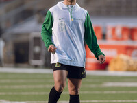 Oregon quarterback Dillon Gabriel #8 warms up at Camp Randall Stadium against the Wisconsin Badgers in Madison, Wisconsin, on November 16, 2...