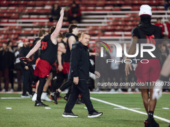 Wisconsin Badgers Offensive Coordinator Phil Longo looks on as the Wisconsin Badgers warm up at Camp Randall Stadium against the Oregon Duck...