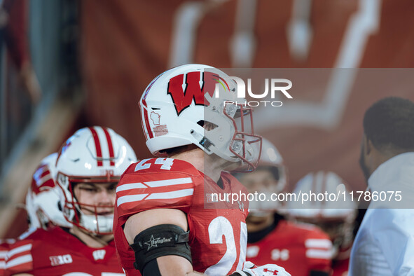 Wisconsin Badgers safety Hunter Wohler #24 leads Wisconsin out of the tunnel at Camp Randall Stadium as they take on the Oregon Ducks in Mad...