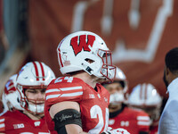 Wisconsin Badgers safety Hunter Wohler #24 leads Wisconsin out of the tunnel at Camp Randall Stadium as they take on the Oregon Ducks in Mad...