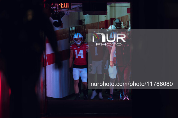 Wisconsin Badgers Head Coach Luke Fickell leads Wisconsin out of the tunnel at Camp Randall Stadium as they take on the Oregon Ducks in Madi...