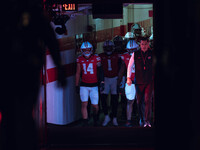 Wisconsin Badgers Head Coach Luke Fickell leads Wisconsin out of the tunnel at Camp Randall Stadium as they take on the Oregon Ducks in Madi...