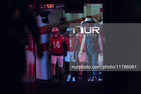 Wisconsin Badgers Head Coach Luke Fickell leads Wisconsin out of the tunnel at Camp Randall Stadium as they take on the Oregon Ducks in Madi...