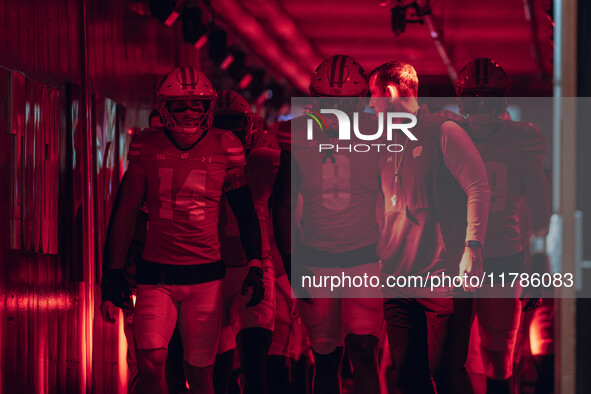 Wisconsin Badgers Head Coach Luke Fickell leads Wisconsin out of the tunnel at Camp Randall Stadium as they take on the Oregon Ducks in Madi...