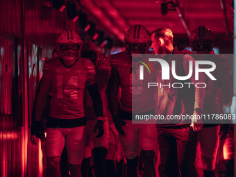 Wisconsin Badgers Head Coach Luke Fickell leads Wisconsin out of the tunnel at Camp Randall Stadium as they take on the Oregon Ducks in Madi...