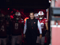 Wisconsin Badgers Head Coach Luke Fickell leads Wisconsin out of the tunnel at Camp Randall Stadium as they take on the Oregon Ducks in Madi...