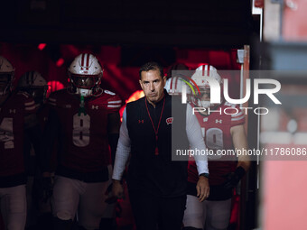 Wisconsin Badgers Head Coach Luke Fickell leads Wisconsin out of the tunnel at Camp Randall Stadium as they take on the Oregon Ducks in Madi...