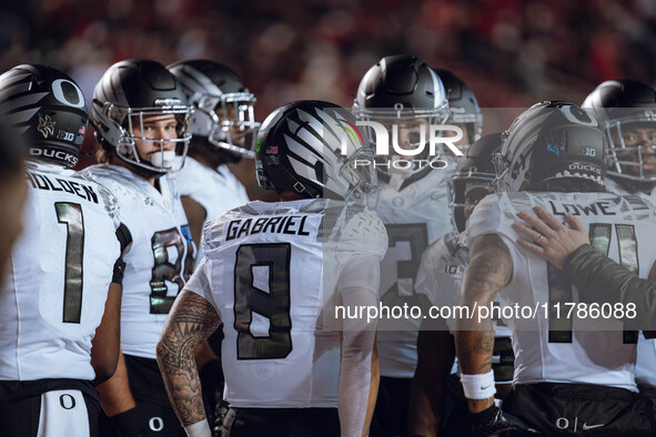 Oregon quarterback Dillon Gabriel #8 rallies the Oregon Ducks as they take on the Wisconsin Badgers at Camp Randall Stadium in Madison, Wisc...