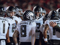 Oregon quarterback Dillon Gabriel #8 rallies the Oregon Ducks as they take on the Wisconsin Badgers at Camp Randall Stadium in Madison, Wisc...