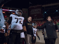 Oregon head coach Dan Lanning leads the Oregon Ducks out of the tunnel at Camp Randall Stadium as they take on the Wisconsin Badgers in Madi...