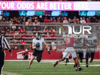 Oregon tight end Terrance Ferguson #3 heads upfield after a catch against the Wisconsin Badgers at Camp Randall Stadium in Madison, Wisconsi...