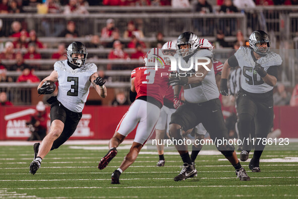 Oregon tight end Terrance Ferguson #3 heads upfield after a catch against the Wisconsin Badgers at Camp Randall Stadium in Madison, Wisconsi...