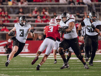 Oregon tight end Terrance Ferguson #3 heads upfield after a catch against the Wisconsin Badgers at Camp Randall Stadium in Madison, Wisconsi...