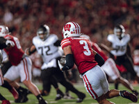 Wisconsin Badgers cornerback Nyzier Fourqurean #3 runs down the field after intercepting a pass against the Oregon Ducks at Camp Randall Sta...