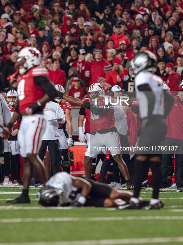 Wisconsin Badgers outside linebacker Leon Lowery Jr. #8 signals a turnover against The Oregon Ducks at Camp Randall Stadium in Madison, Wisc...