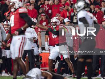 Wisconsin Badgers outside linebacker Leon Lowery Jr. #8 signals a turnover against The Oregon Ducks at Camp Randall Stadium in Madison, Wisc...