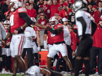 Wisconsin Badgers outside linebacker Leon Lowery Jr. #8 signals a turnover against The Oregon Ducks at Camp Randall Stadium in Madison, Wisc...