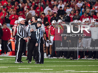 Wisconsin Badgers Head Coach Luke Fickell has a call explained to him on the field against The Oregon Ducks at Camp Randall Stadium in Madis...