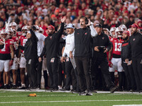 Wisconsin Badgers Head Coach Luke Fickell and the Wisconsin Badgers sideline react to a penalty as they take on the Oregon Ducks at Camp Ran...