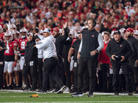 Wisconsin Badgers Head Coach Luke Fickell and the Wisconsin Badgers sideline react to a penalty as they take on the Oregon Ducks at Camp Ran...