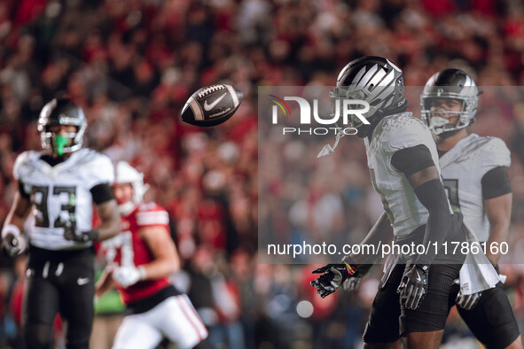 Oregon defensive back Dontae Manning #8 watches a punt against the Wisconsin Badgers at Camp Randall Stadium in Madison, Wisconsin, on Novem...