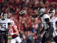 Oregon defensive back Dontae Manning #8 watches a punt against the Wisconsin Badgers at Camp Randall Stadium in Madison, Wisconsin, on Novem...