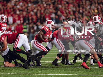 Wisconsin Badgers running back Tawee Walker #3 attacks the Oregon Ducks defense at Camp Randall Stadium in Madison, Wisconsin, on November 1...