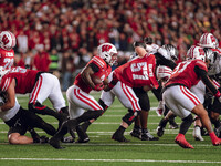 Wisconsin Badgers running back Tawee Walker #3 attacks the Oregon Ducks defense at Camp Randall Stadium in Madison, Wisconsin, on November 1...