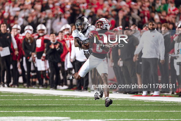 Wisconsin Badgers wide receiver Vinny Anthony II #8 catches a long pass against the Oregon Ducks at Camp Randall Stadium in Madison, Wiscons...