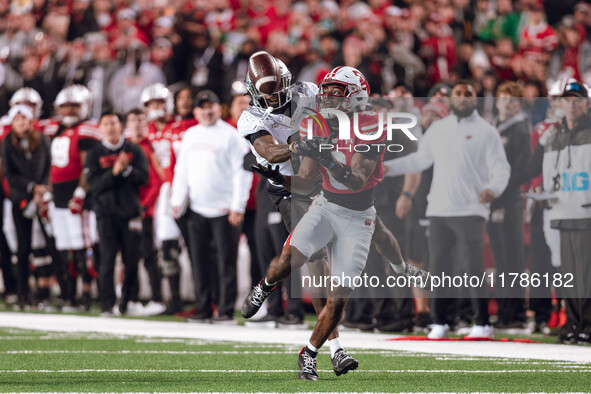 Wisconsin Badgers wide receiver Vinny Anthony II #8 catches a long pass against the Oregon Ducks at Camp Randall Stadium in Madison, Wiscons...