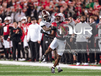 Wisconsin Badgers wide receiver Vinny Anthony II #8 catches a long pass against the Oregon Ducks at Camp Randall Stadium in Madison, Wiscons...