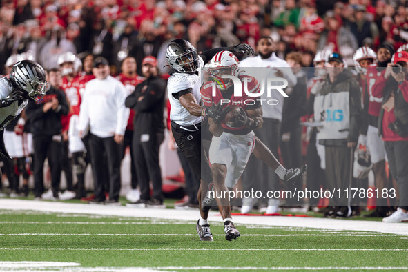 Wisconsin Badgers wide receiver Vinny Anthony II #8 catches a long pass against the Oregon Ducks at Camp Randall Stadium in Madison, Wiscons...