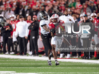 Wisconsin Badgers wide receiver Vinny Anthony II #8 catches a long pass against the Oregon Ducks at Camp Randall Stadium in Madison, Wiscons...