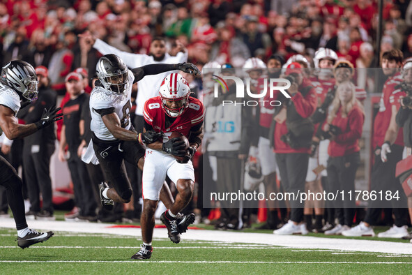 Wisconsin Badgers wide receiver Vinny Anthony II #8 catches a long pass against the Oregon Ducks at Camp Randall Stadium in Madison, Wiscons...