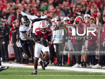 Wisconsin Badgers wide receiver Vinny Anthony II #8 catches a long pass against the Oregon Ducks at Camp Randall Stadium in Madison, Wiscons...