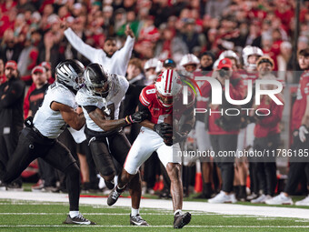 Wisconsin Badgers wide receiver Vinny Anthony II #8 catches a long pass against the Oregon Ducks at Camp Randall Stadium in Madison, Wiscons...