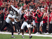 Wisconsin Badgers wide receiver Vinny Anthony II #8 catches a long pass against the Oregon Ducks at Camp Randall Stadium in Madison, Wiscons...