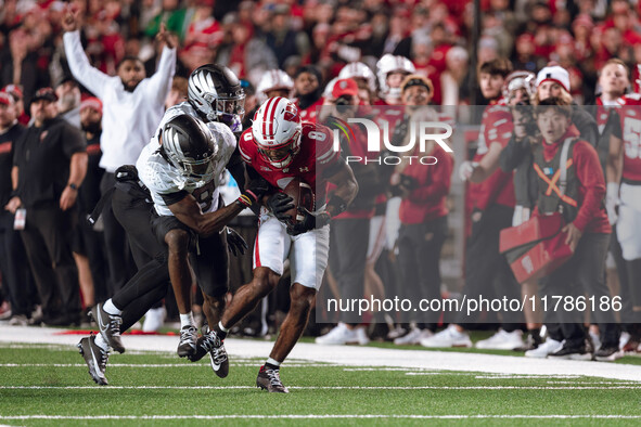 Wisconsin Badgers wide receiver Vinny Anthony II #8 catches a long pass against the Oregon Ducks at Camp Randall Stadium in Madison, Wiscons...