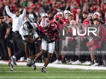 Wisconsin Badgers wide receiver Vinny Anthony II #8 catches a long pass against the Oregon Ducks at Camp Randall Stadium in Madison, Wiscons...