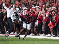 Wisconsin Badgers wide receiver Vinny Anthony II #8 catches a long pass against the Oregon Ducks at Camp Randall Stadium in Madison, Wiscons...