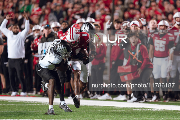 Wisconsin Badgers wide receiver Vinny Anthony II #8 catches a long pass against the Oregon Ducks at Camp Randall Stadium in Madison, Wiscons...