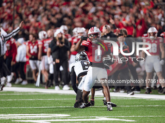 Wisconsin Badgers wide receiver Vinny Anthony II #8 catches a long pass against the Oregon Ducks at Camp Randall Stadium in Madison, Wiscons...