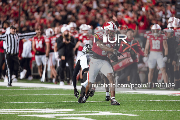 Wisconsin Badgers wide receiver Vinny Anthony II #8 catches a long pass against the Oregon Ducks at Camp Randall Stadium in Madison, Wiscons...