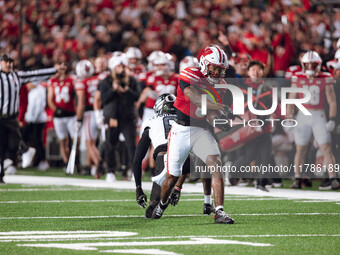 Wisconsin Badgers wide receiver Vinny Anthony II #8 catches a long pass against the Oregon Ducks at Camp Randall Stadium in Madison, Wiscons...