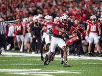 Wisconsin Badgers wide receiver Vinny Anthony II #8 catches a long pass against the Oregon Ducks at Camp Randall Stadium in Madison, Wiscons...